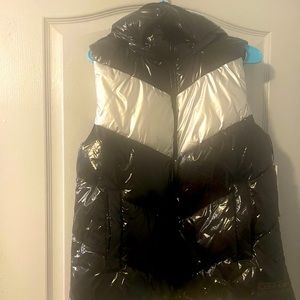 Bundle up with a Calvin Klein vest with hood NWT